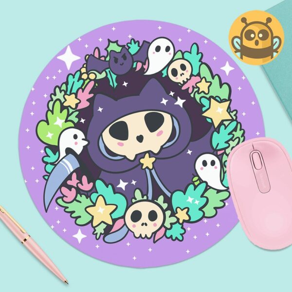 This image shows an hand-drawn adorable mousepad, Kitty Reaper Mousepad, which is available to purchase from HunnieByte.com