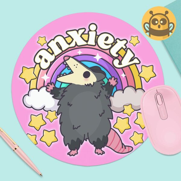 This image shows an hand-drawn adorable mousepad, Anxiety Rainbow Possum Mousepad, which is available to purchase from HunnieByte.com