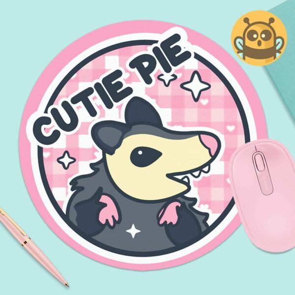 This image shows an hand-drawn adorable mousepad, Cutie Pie Possum Mousepad, which is available to purchase from HunnieByte.com