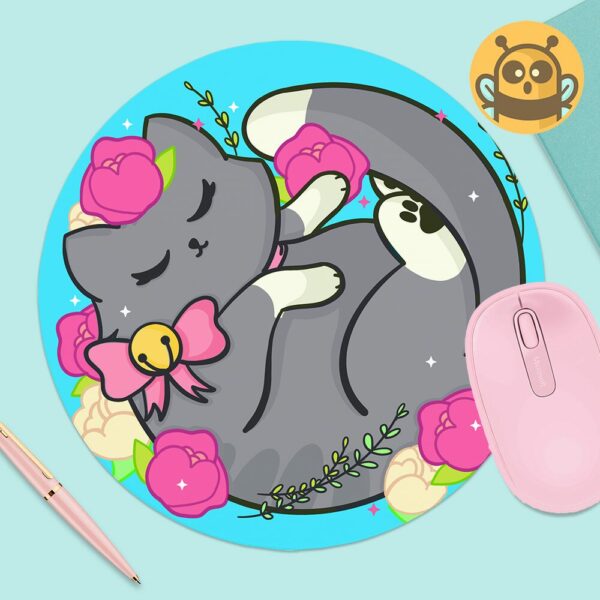 This image shows an hand-drawn adorable mousepad, Floral Gray Kitty Mousepad, which is available to purchase from HunnieByte.com