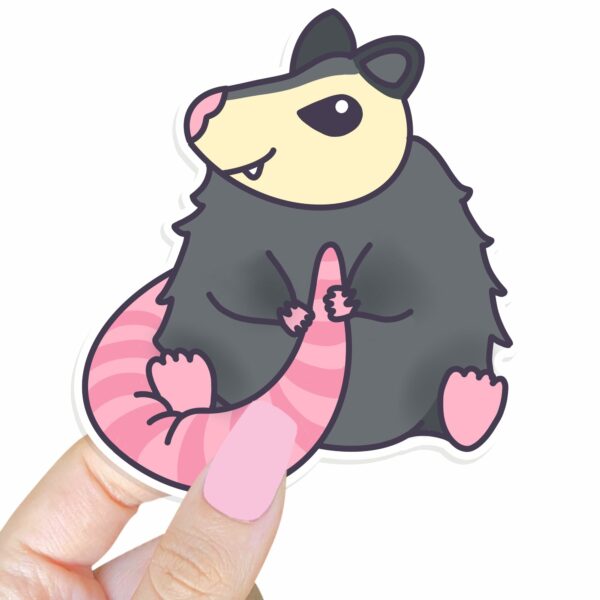 This image shows an hand-drawn adorable sticker, Adorable Possum Sticker, which is available to purchase from HunnieByte.com