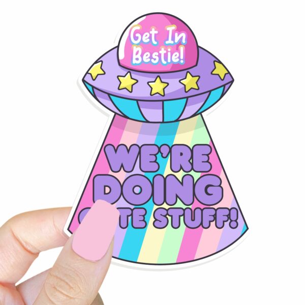 This image shows our adorable sticker finishes, Get In Bestie We're Doing Cute Stuff Sticker, which is available to purchase from HunnieByte.com