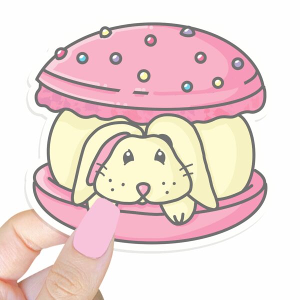 This image shows an hand-drawn adorable sticker, Bunny Macaroon Sticker, which is available to purchase from HunnieByte.com