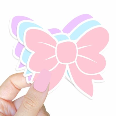 This image shows an hand-drawn adorable sticker, Pastel Bow Sticker, which is available to purchase from HunnieByte.com