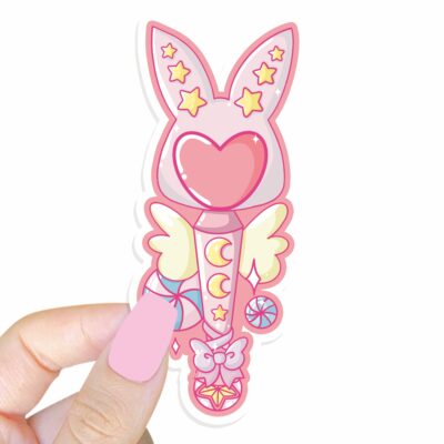 This image shows an hand-drawn adorable sticker, Bunny Magical Wand Sticker, which is available to purchase from HunnieByte.com