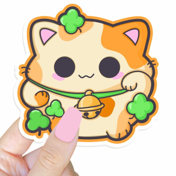 This image shows an hand-drawn adorable sticker, Lucky Calico Cat Sticker, which is available to purchase from HunnieByte.com