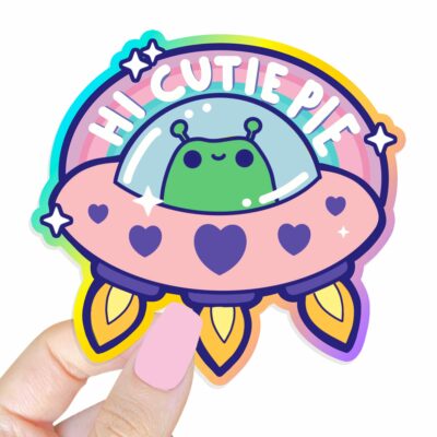 This image shows an hand-drawn adorable sticker, Hi Cutie Pie Alien Sticker, which is available to purchase from HunnieByte.com