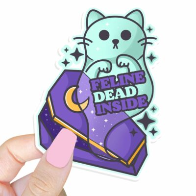 This image shows our adorable sticker finishes, Feline Dead Inside Sticker, which is available to purchase from HunnieByte.com