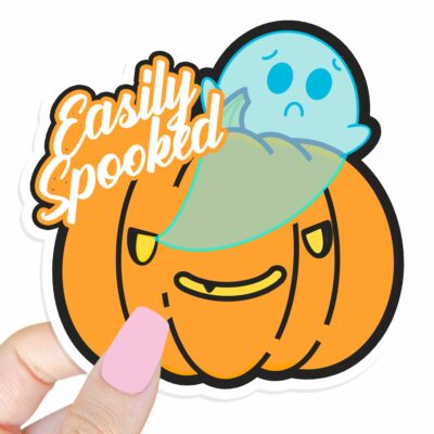 This image shows an hand-drawn adorable sticker, Easily Spooked Ghost Sticker, which is available to purchase from HunnieByte.com