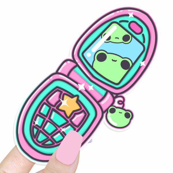 This image shows an hand-drawn adorable sticker, Froggy Flip Phone Sticker, which is available to purchase from HunnieByte.com