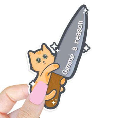 This image shows our adorable sticker finishes, Gimme A Reason Stabby Kitty Sticker, which is available to purchase from HunnieByte.com