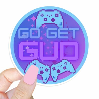 This image shows our adorable sticker finishes, Go Get Gud Gamer Sticker, which is available to purchase from HunnieByte.com