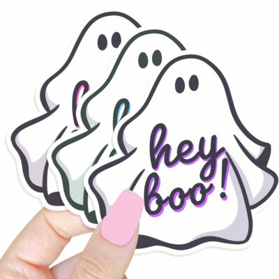 This image shows an hand-drawn adorable sticker, Hey Boo Ghost Sticker, which is available to purchase from HunnieByte.com