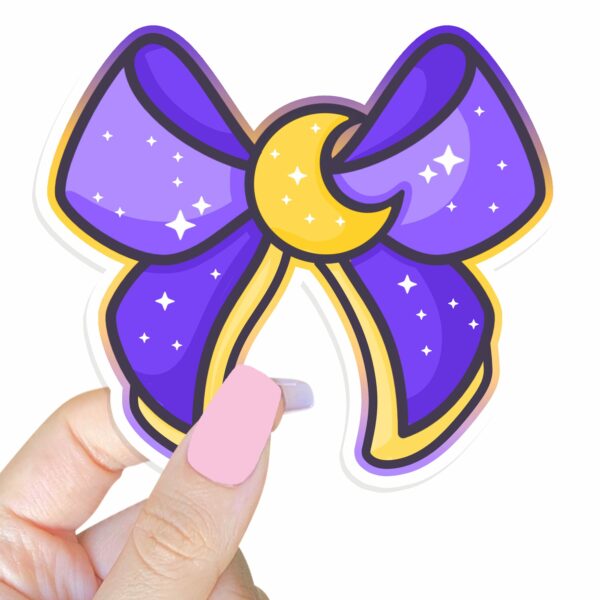 This image shows our adorable sticker finishes, Magical Girl Moon Bow Sticker, which is available to purchase from HunnieByte.com