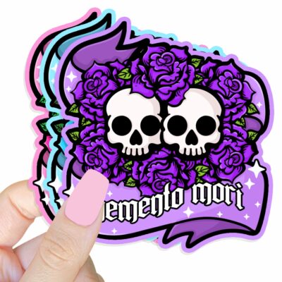 This image shows our adorable sticker finishes, Memento Mori Sticker, which is available to purchase from HunnieByte.com