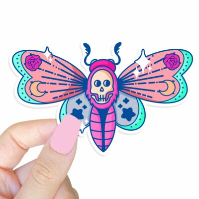 This image shows our adorable sticker finishes, Pastel Deaths Head Moth Sticker, which is available to purchase from HunnieByte.com