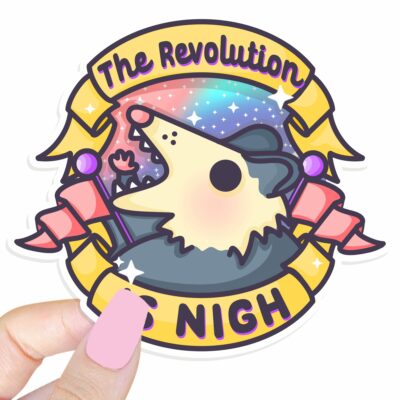 This image shows our adorable sticker finishes, The Revolution is Nigh Possum Sticker, which is available to purchase from HunnieByte.com