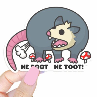 This image shows our adorable sticker finishes, He Root He Toot Possum Sticker, which is available to purchase from HunnieByte.com