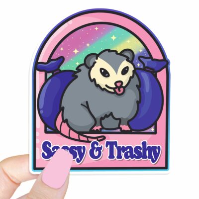 This image shows our adorable sticker finishes, Sassy And Trashy Possum Sticker, which is available to purchase from HunnieByte.com