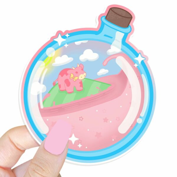 This image shows an hand-drawn adorable sticker, Strawberry Cow Potion Sticker, which is available to purchase from HunnieByte.com