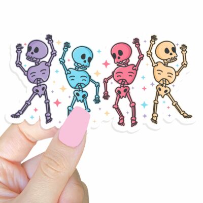 This image shows an hand-drawn adorable sticker, Skeleton Dance Party Sticker, which is available to purchase from HunnieByte.com