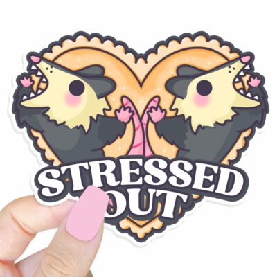 This image shows our adorable sticker finishes, Stressed Out Possum Sticker, which is available to purchase from HunnieByte.com