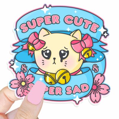 This image shows our adorable sticker finishes, Super Cute Super Sad Kitty Sticker, which is available to purchase from HunnieByte.com