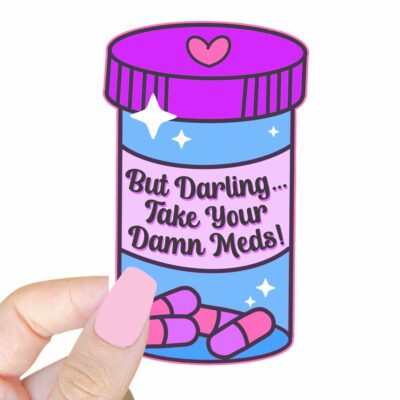 This image shows our adorable sticker finishes, But Darling Take Your Damn Meds Sticker, which is available to purchase from HunnieByte.com