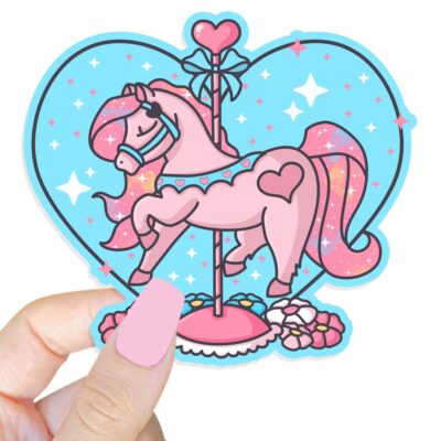 This image shows an hand-drawn adorable sticker, Carousel Horse Twinkle Heart Sticker, which is available to purchase from HunnieByte.com