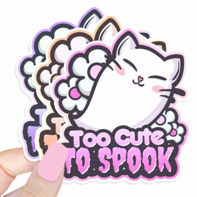 This image shows an hand-drawn adorable sticker, Too Cute To Spook Sticker, which is available to purchase from HunnieByte.com