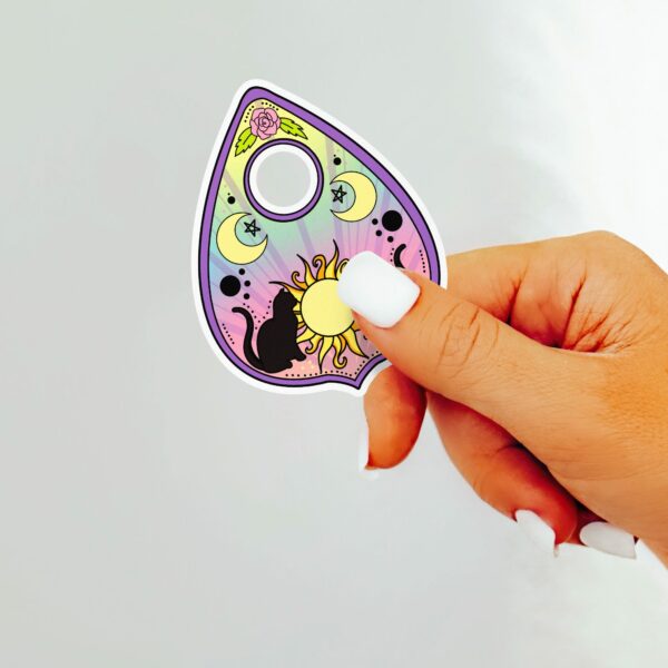 This image shows our adorable sticker finishes, Cat Planchette Sticker, which is available to purchase from HunnieByte.com