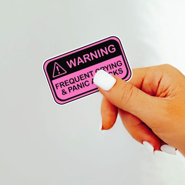 This image shows our adorable sticker finishes, Warning Frequent Panic Attacks Sticker, which is available to purchase from HunnieByte.com