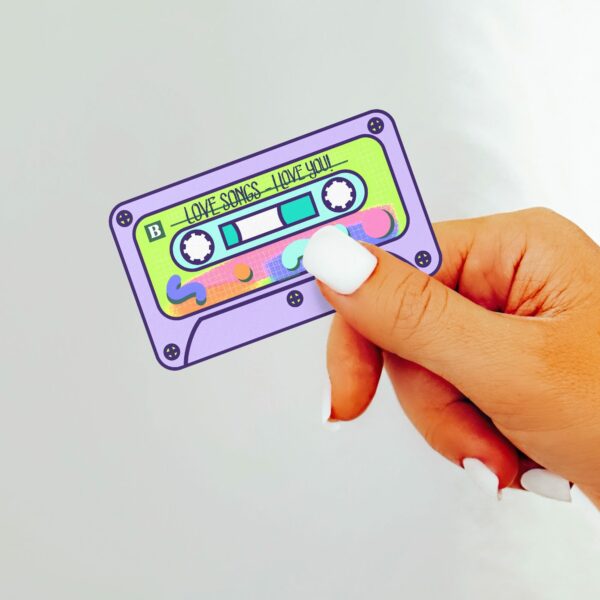 This image shows our adorable sticker finishes, Mixed Tape Love Songs Sticker, which is available to purchase from HunnieByte.com