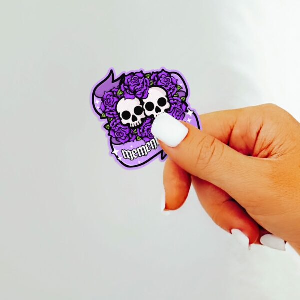 This image shows our adorable sticker finishes, Memento Mori Sticker, which is available to purchase from HunnieByte.com