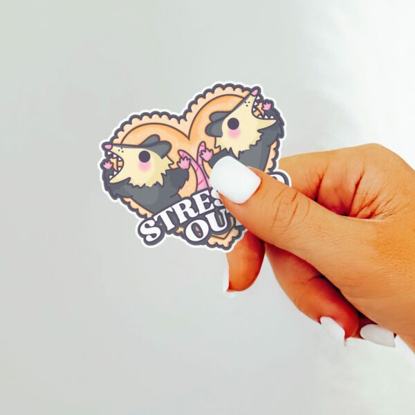 This image shows our adorable sticker finishes, Stressed Out Possum Sticker, which is available to purchase from HunnieByte.com