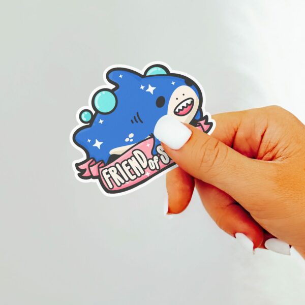 This image shows an hand-drawn adorable sticker, Friend of Shork Shark Sticker, which is available to purchase from HunnieByte.com