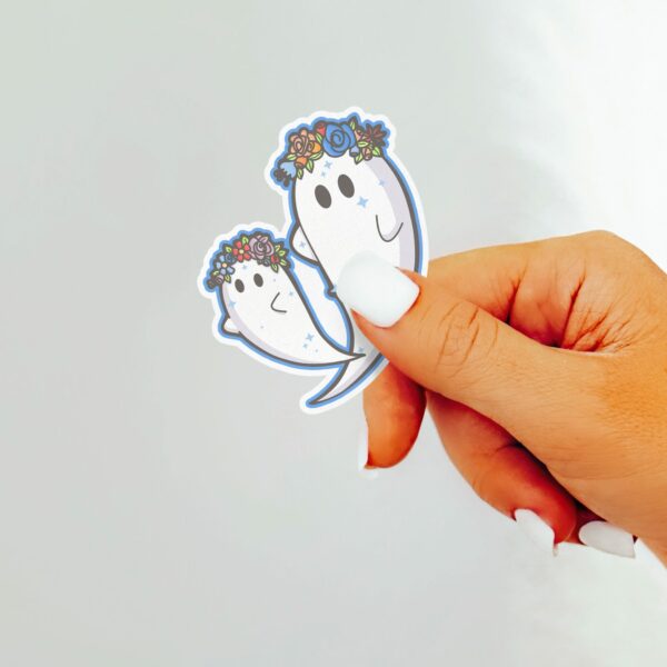 This image shows an hand-drawn adorable sticker, Floral Ghosts Sticker, which is available to purchase from HunnieByte.com