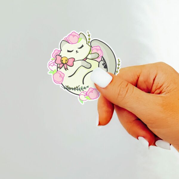 This image shows an hand-drawn adorable sticker, Floral White Kitty Sticker, which is available to purchase from HunnieByte.com