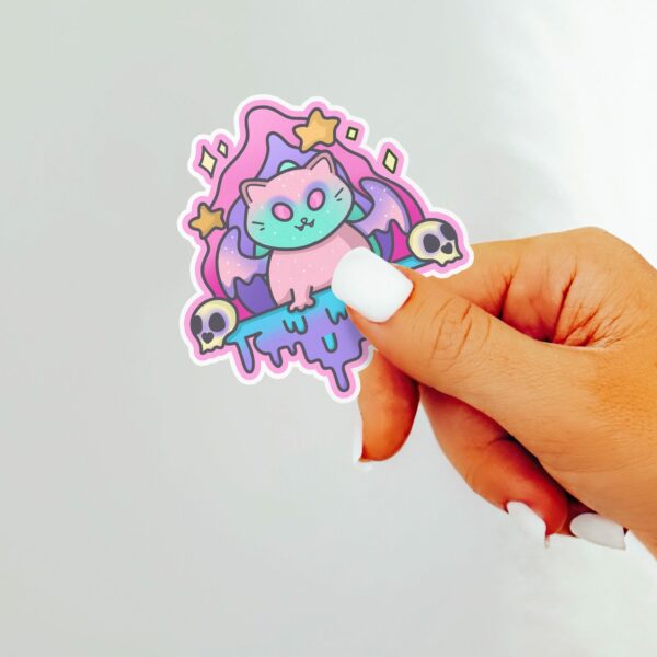 This image shows our adorable sticker finishes, Creepy Dripping Kitty Sticker, which is available to purchase from HunnieByte.com