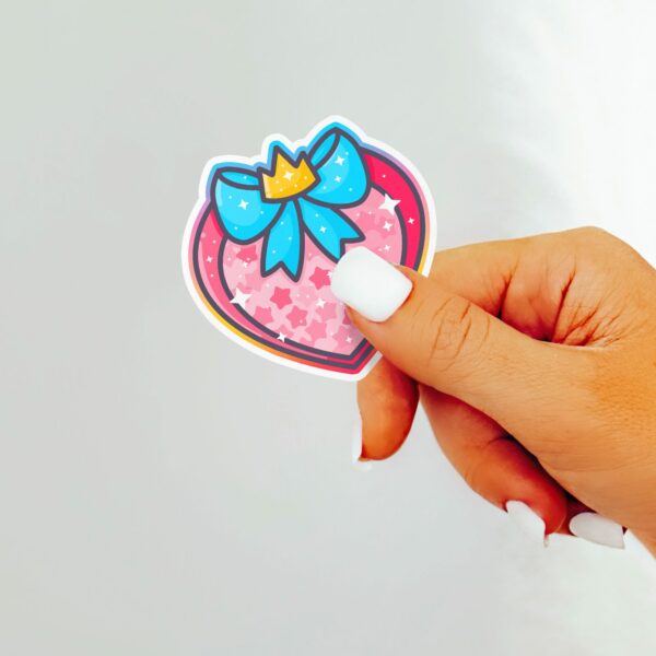 This image shows an hand-drawn adorable sticker, Magical Girl Heart Shield Sticker, which is available to purchase from HunnieByte.com