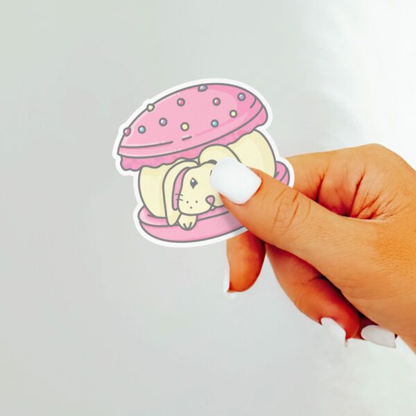 This image shows an hand-drawn adorable sticker, Bunny Macaroon Sticker, which is available to purchase from HunnieByte.com