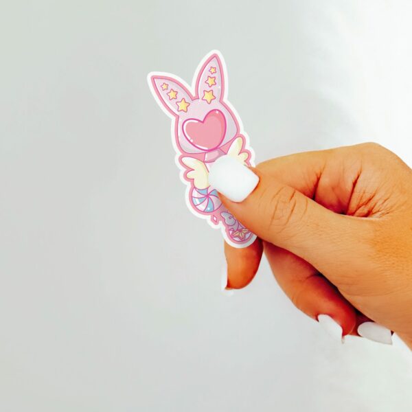 This image shows an hand-drawn adorable sticker, Bunny Magical Wand Sticker, which is available to purchase from HunnieByte.com