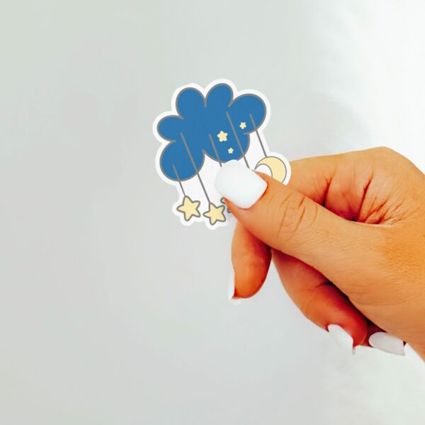 This image shows an hand-drawn adorable sticker, Stormy Clouds Sticker, which is available to purchase from HunnieByte.com