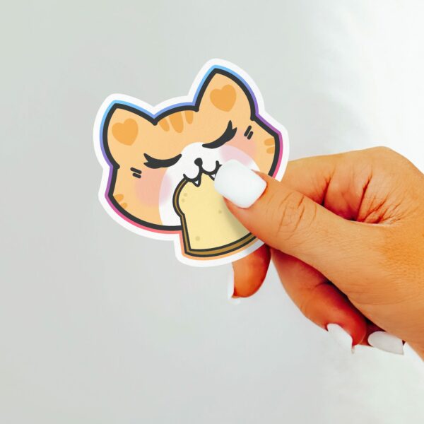 This image shows an hand-drawn adorable sticker, Kitty Toast Sticker, which is available to purchase from HunnieByte.com