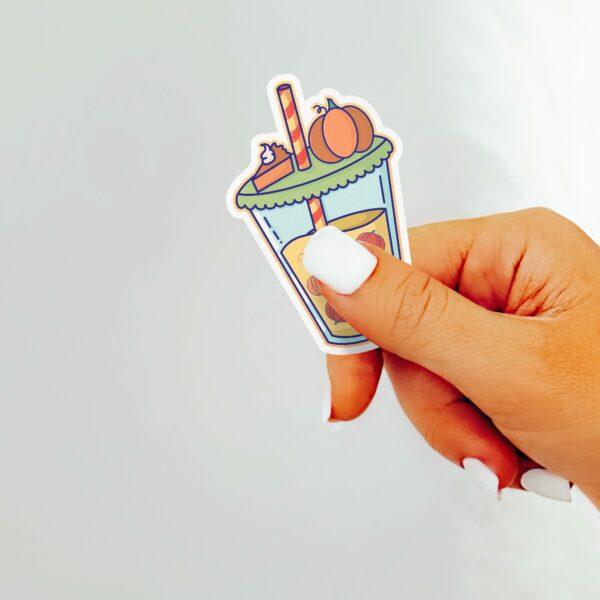 This image shows an hand-drawn adorable sticker, Pumpkin Boba Sticker, which is available to purchase from HunnieByte.com