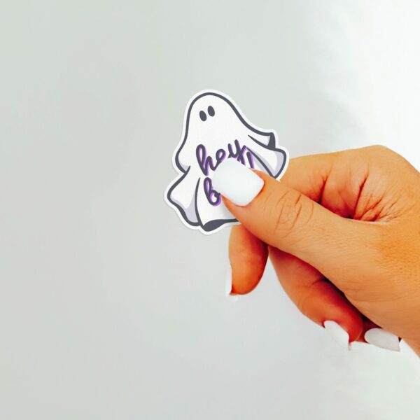 This image shows an hand-drawn adorable sticker, Hey Boo Ghost Sticker, which is available to purchase from HunnieByte.com