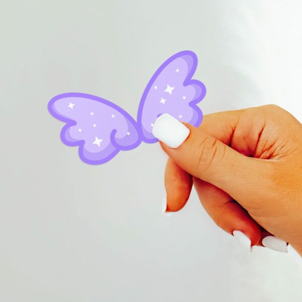 This image shows an hand-drawn adorable sticker, Cute Sparkle Wings Sticker, which is available to purchase from HunnieByte.com