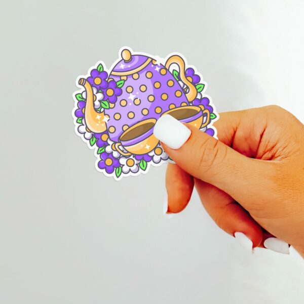 This image shows an hand-drawn adorable sticker, Cute Teapots Sticker, which is available to purchase from HunnieByte.com