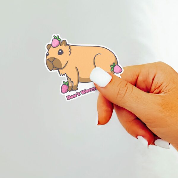 This image shows an hand-drawn adorable sticker, Dont Worry Be Cappy Sticker, which is available to purchase from HunnieByte.com