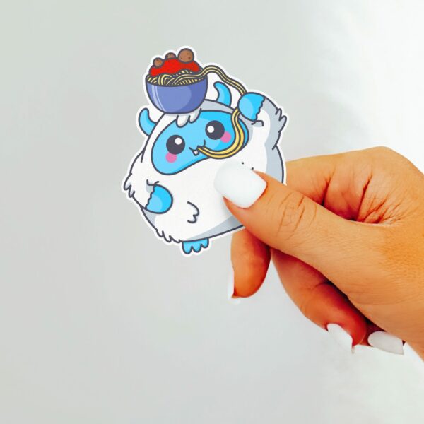 This image shows an hand-drawn adorable sticker, Yeti Spaghetti Sticker, which is available to purchase from HunnieByte.com